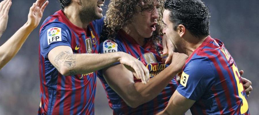 Los jugadores del Barça celebran el gol de Puyol Los jugadores del Barça celebran el gol de Puyol