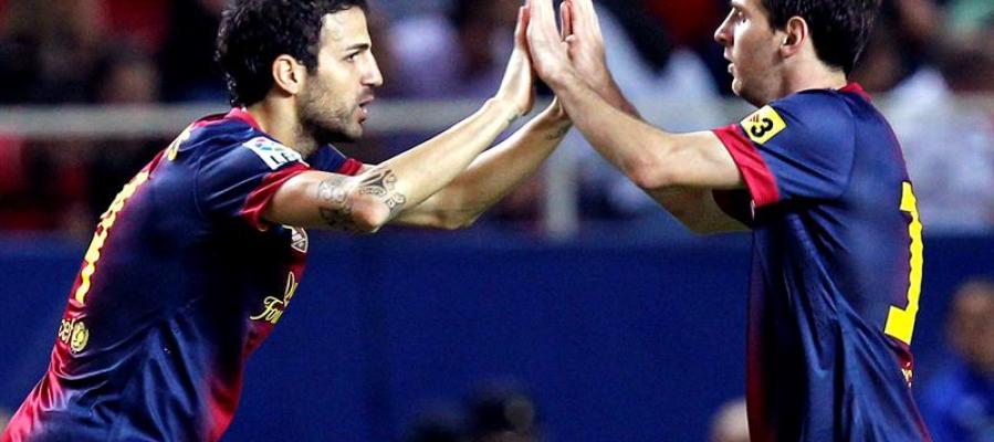 Cesc Fábregas y Leo Messi celebran un gol Cesc Fábregas y Leo Messi celebran un gol
