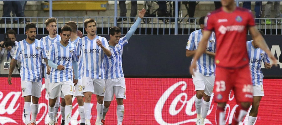 Los jugadores del Málaga celebran un gol ante el Getafe Los jugadores del Málaga celebran un gol ante el Getafe