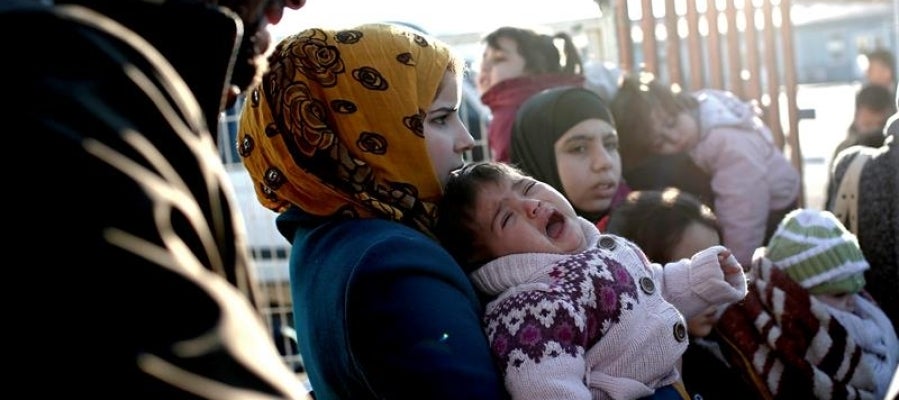 Familias de refugiados en la frontera de Siria con Turquía Familias de refugiados en la frontera de Siria con Turquía