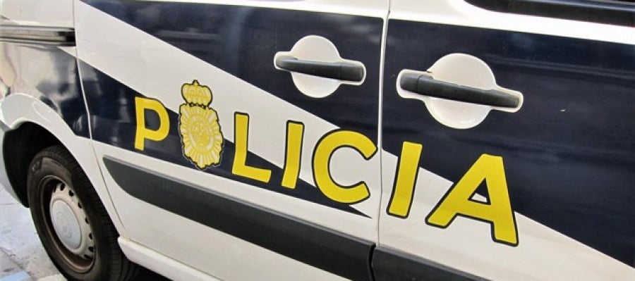 Un coche de la Policía. Un coche de la Policía.