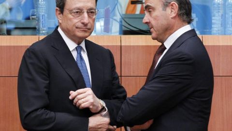 Mario Draghi y Luis de Guindos