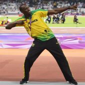 Usain Bolt con su medalla de oro