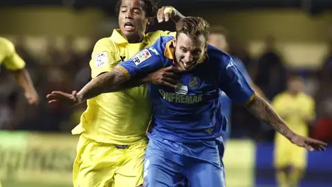 Alexis Ruano y el delantero mexicano Giovani dos Santos. Alexis Ruano y el delantero mexicano Giovani dos Santos.