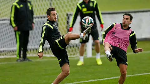 Koke y Xavi, durante el entrenamiento de la selección española Koke y Xavi, durante el entrenamiento de la selección española
