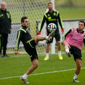 Koke y Xavi, durante el entrenamiento de la selección española