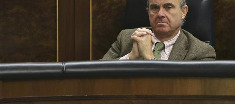 Luis de Guindos en su escaño del Congreso Luis de Guindos en su escaño del Congreso
