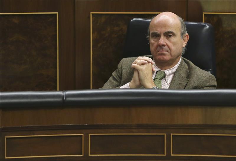 De Guindos garantiza que Hacienda cumplirá la ley en caso de Rato De Guindos garantiza que Hacienda cumplirá la ley en caso de Rato