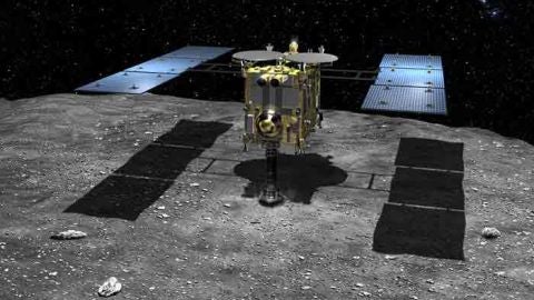 Representaci&oacute;n art&iacute;stica de la sonda Hayabusa 2 en el momento de tocar al asteroide (162173) 1999 JU3 para recoger muestras