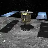 Representación artística de la sonda Hayabusa 2 en el momento de tocar al asteroide (162173) 1999 JU3 para recoger muestras Representación artística de la sonda Hayabusa 2 en el momento de tocar al asteroide (162173) 1999 JU3 para recoger muestras