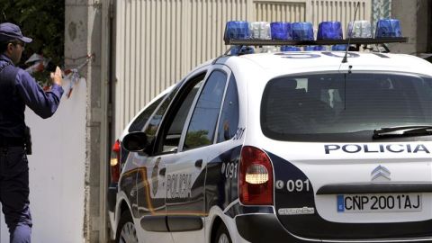 Un coche de la Polic&iacute;a en un suceso