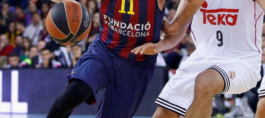 Juan Carlos Navarro, en acción ante Felipe Reyes Juan Carlos Navarro, en acción ante Felipe Reyes