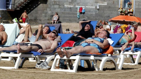 Turistas en la playa