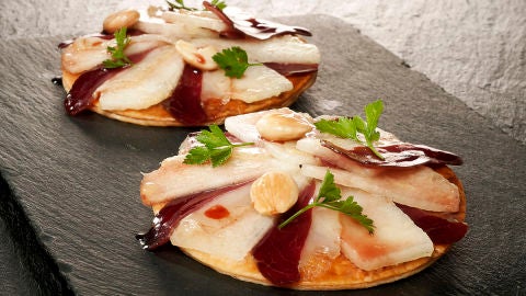 Tostas de mel&oacute;n con jam&oacute;n de pato