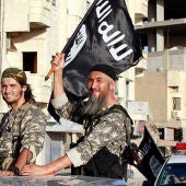 Militantes yihadistas durante un desfile militar por las calles de una provincia de Siria 