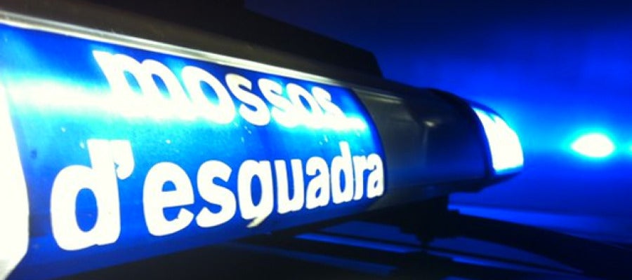 Luces de un coche de los Mossos Luces de un coche de los Mossos