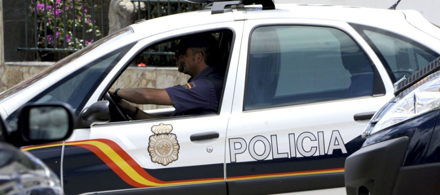 Un coche de Policía Un coche de Policía