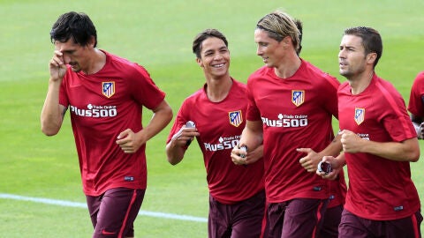 Fernando Torres y Oliver Torres, en el entrenamiento en el Cerro del Espino.