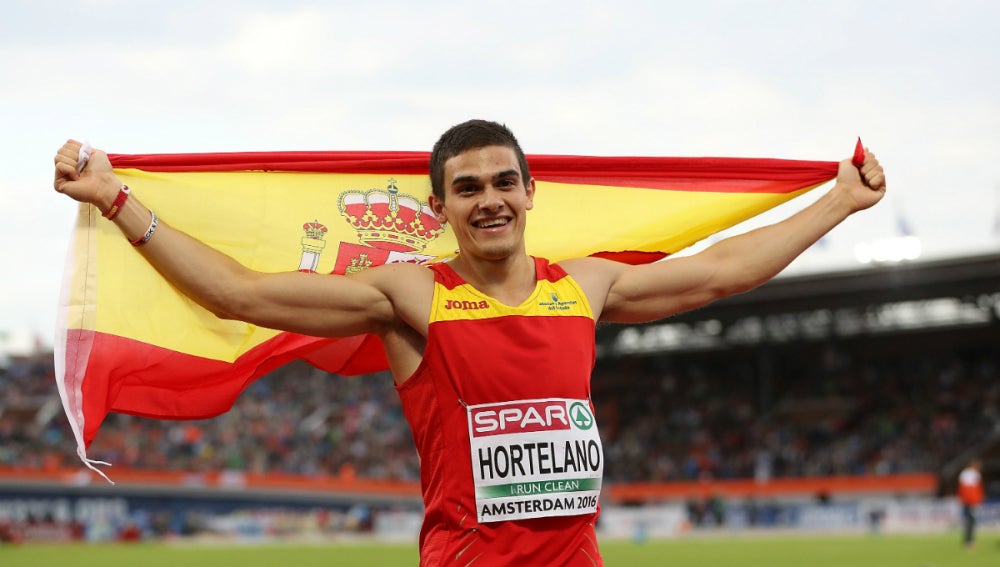 Hortelano, con la bandera de España
