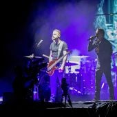 Los integrantes de la banda de rock británica, Muse, durante su actuación esta noche en el Festival Internacional de Benicasim.