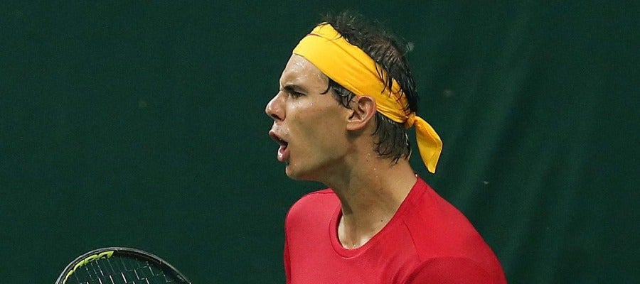 Nadal celebra un punto en el partido de dobles Nadal celebra un punto en el partido de dobles