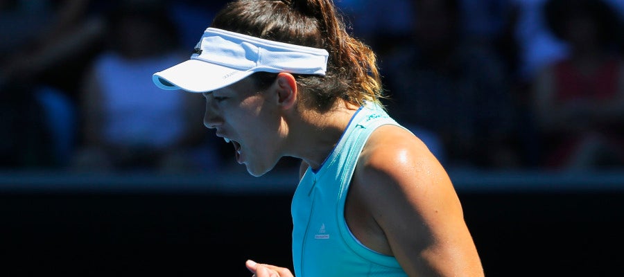 Muguruza celebra un punto contra Marina Erakovic Muguruza celebra un punto contra Marina Erakovic