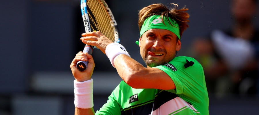 David Ferrer devuelve la pelota en un partido David Ferrer devuelve la pelota en un partido