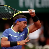 Rafa Nadal golpea la bola en su partido contra Haase Rafa Nadal golpea la bola en su partido contra Haase