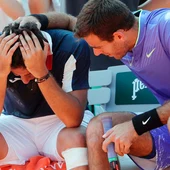 Del Potro consuela a Almagro tras su lesión Del Potro consuela a Almagro tras su lesión