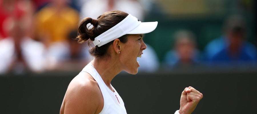 Muguruza celebra un punto ante Ekaterina Alexandrova Muguruza celebra un punto ante Ekaterina Alexandrova