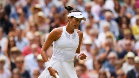 Muguruza celebra un punto ante Rybarikova