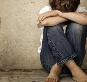 Imagen de un niño víctima de maltrato Imagen de un niño víctima de maltrato