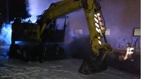 Imagen de archivo de una excavadora Imagen de archivo de una excavadora