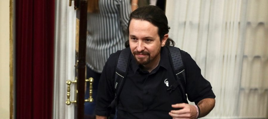 El líder de Podemos, Pablo Iglesias, a su llegada al pleno del Congreso El líder de Podemos, Pablo Iglesias, a su llegada al pleno del Congreso