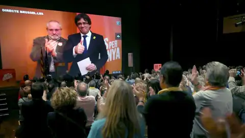 Videoconferencia desde Bruselas con Carles Puigdemont y Lluis Puig. Videoconferencia desde Bruselas con Carles Puigdemont y Lluis Puig.