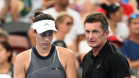 Muguruza, junto a su entrenador en S&iacute;dney