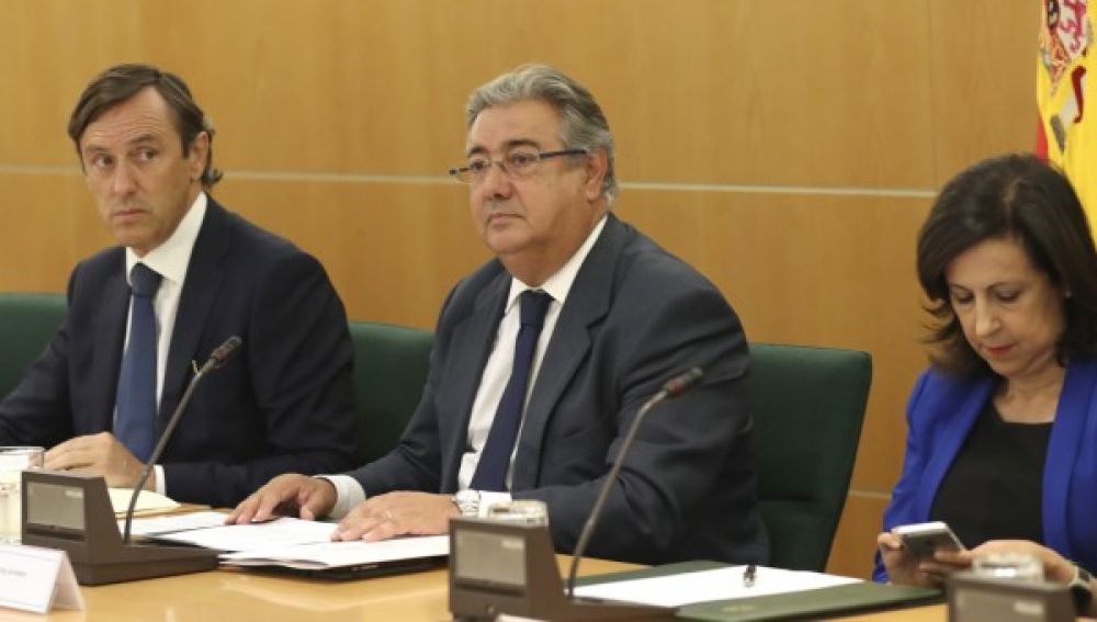Juan Ignacio Zoido, Rafael Hernando y Margarita Robles en la reunión del Pacto Antiterrorista