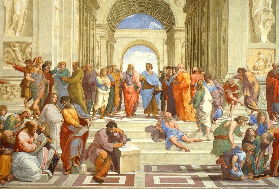 Dos turistas pintan sobre el fresco la Escuela de Atenas de Rafael Dos turistas pintan sobre el fresco la Escuela de Atenas de Rafael