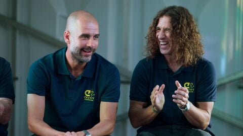 Guardiola y Puyol, en el acto de la Fundaci&oacute;n Cruyff