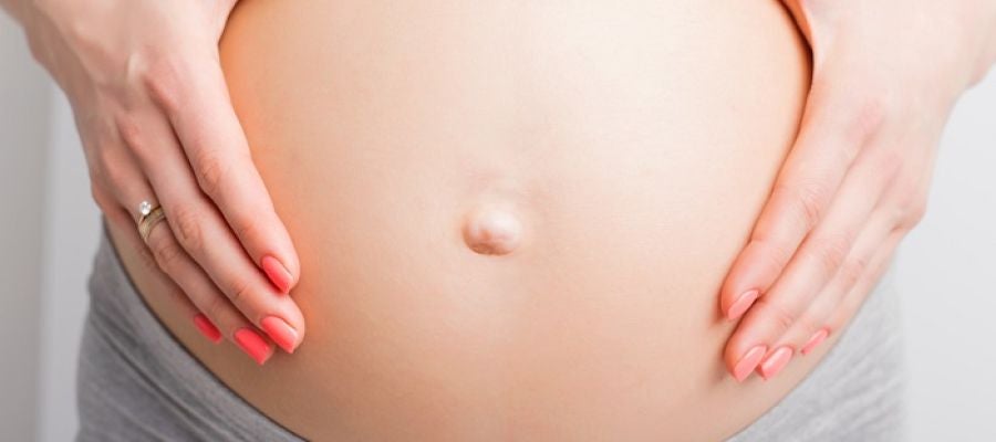Barriga de mujer embarazada Barriga de mujer embarazada
