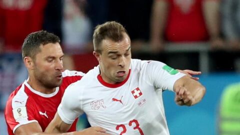 Un momento del partido entre Serbia y Suiza. 