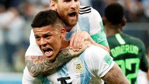 Rojo celebra su gol con Messi. 