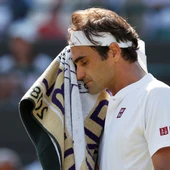 Federer se seca el sudor tras un punto ante Kevin Anderson Federer se seca el sudor tras un punto ante Kevin Anderson