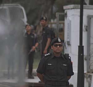 Un policía en Malasia Un policía en Malasia