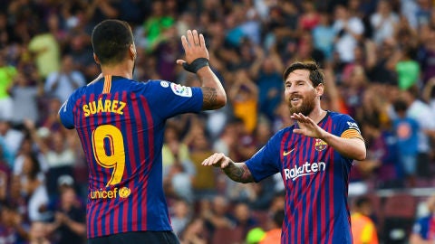 Messi y Su&aacute;rez celebran un gol