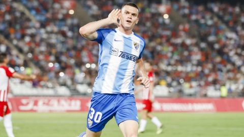 El jugador del M&aacute;laga, Harper, celebra su gol frente al Almer&iacute;a