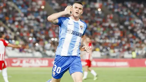 El jugador del Málaga, Harper, celebra su gol frente al Almería El jugador del Málaga, Harper, celebra su gol frente al Almería