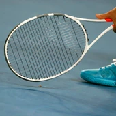 Momento de un partido de tenis Momento de un partido de tenis