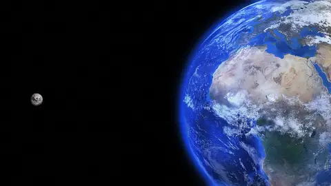 Imagen de archivo de la Luna y la Tierra Imagen de archivo de la Luna y la Tierra
