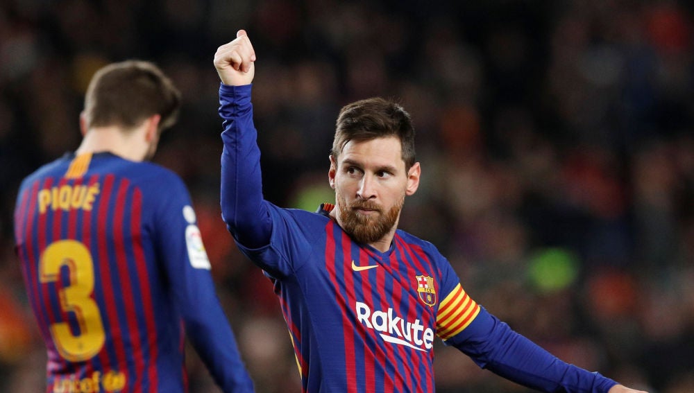 Leo Messi celebra su gol 400 en Liga